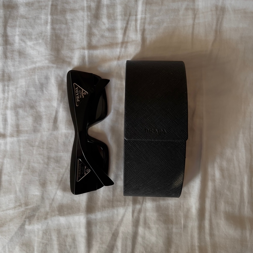 Prada Elegant Black Sunglasses with Case